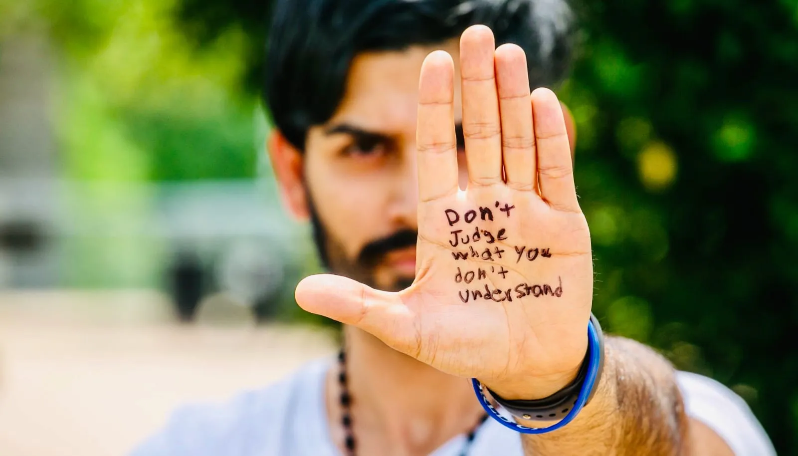 Fares With His Hand Up With A Message